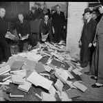NYPD burning books in 1935... IN THEIR FURNACE ROOM!